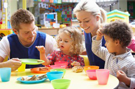 Teachers Assisting the Children