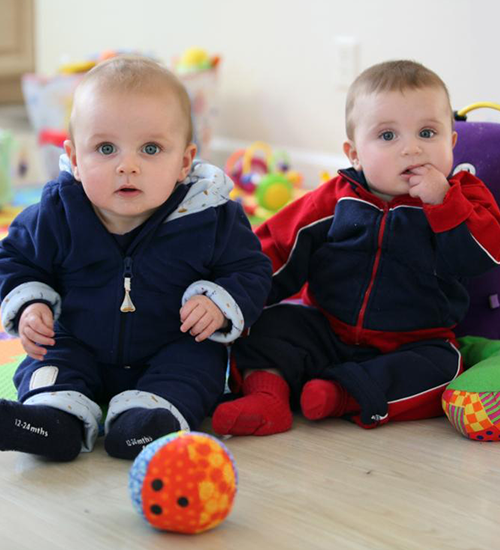 Two Babies Playing